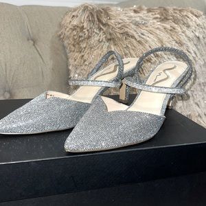 Silver kitten heels